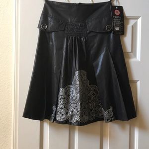 Brand new black asymmetrical nylon skirt